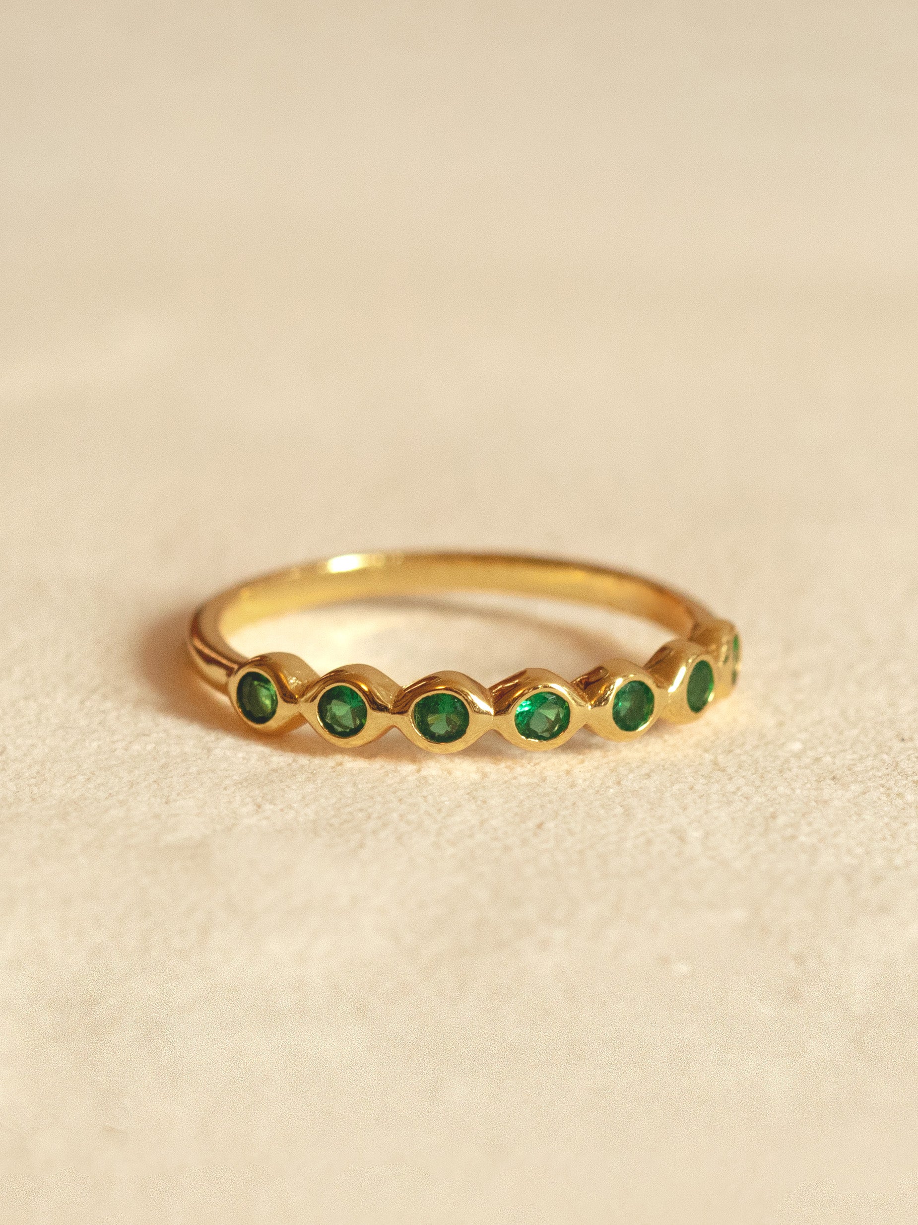 Ring With Emerald Green Stones