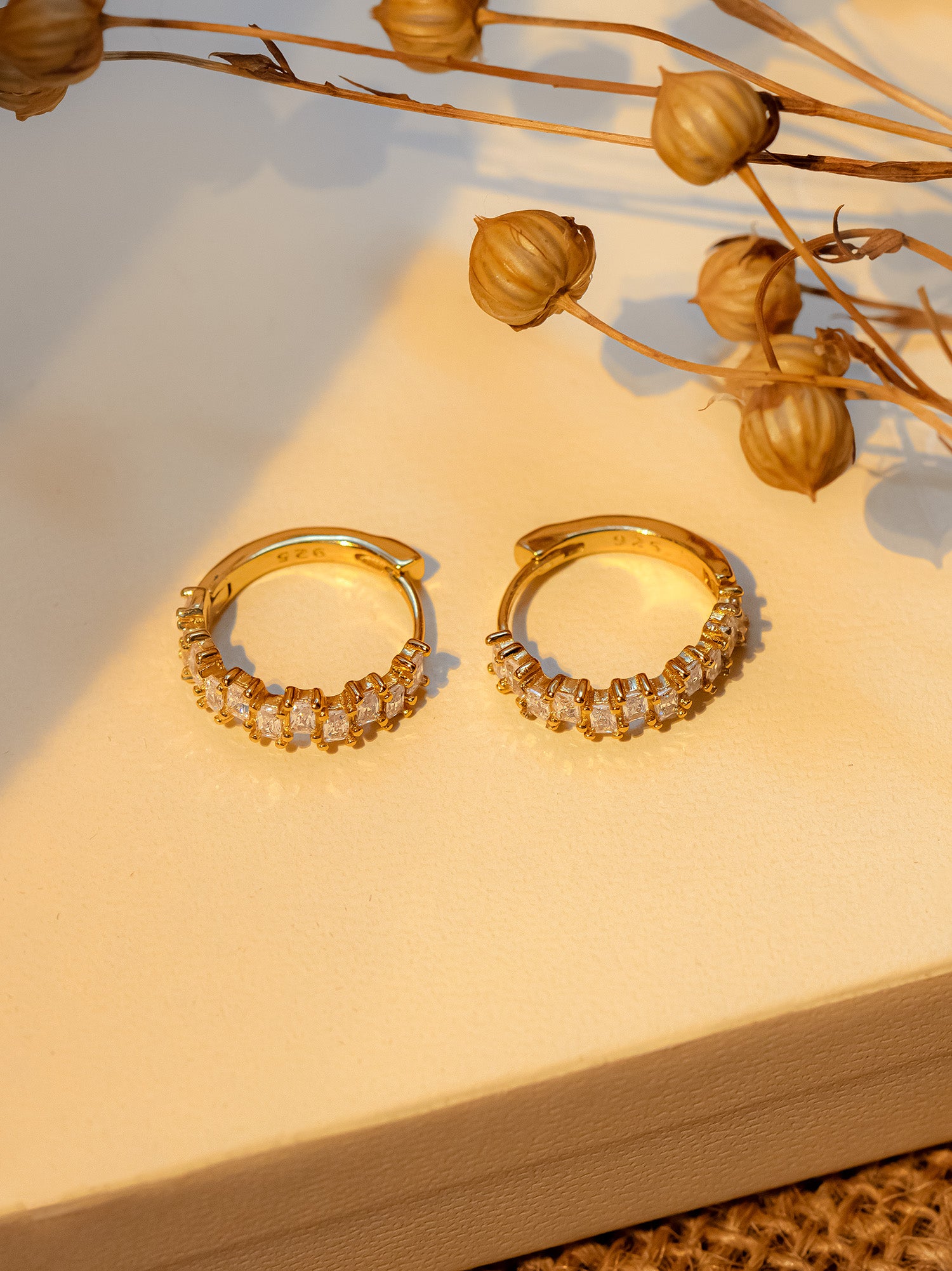 Gold Small Hoop Earrings With Sparkling Baguette Stones