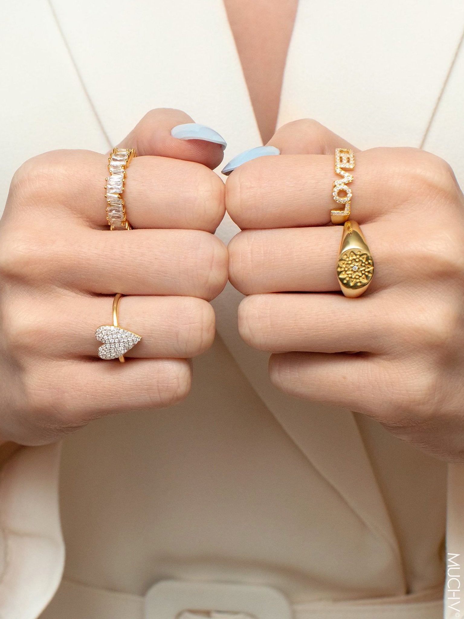 Gold stacking ring paired with other rings.