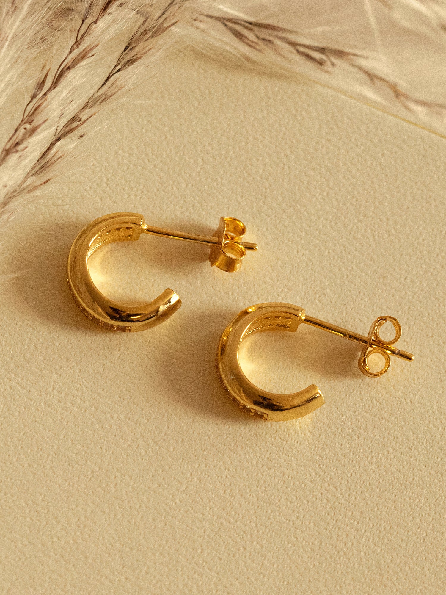 Gold Chunky Huggie Hoop Earrings With Tiny Stones