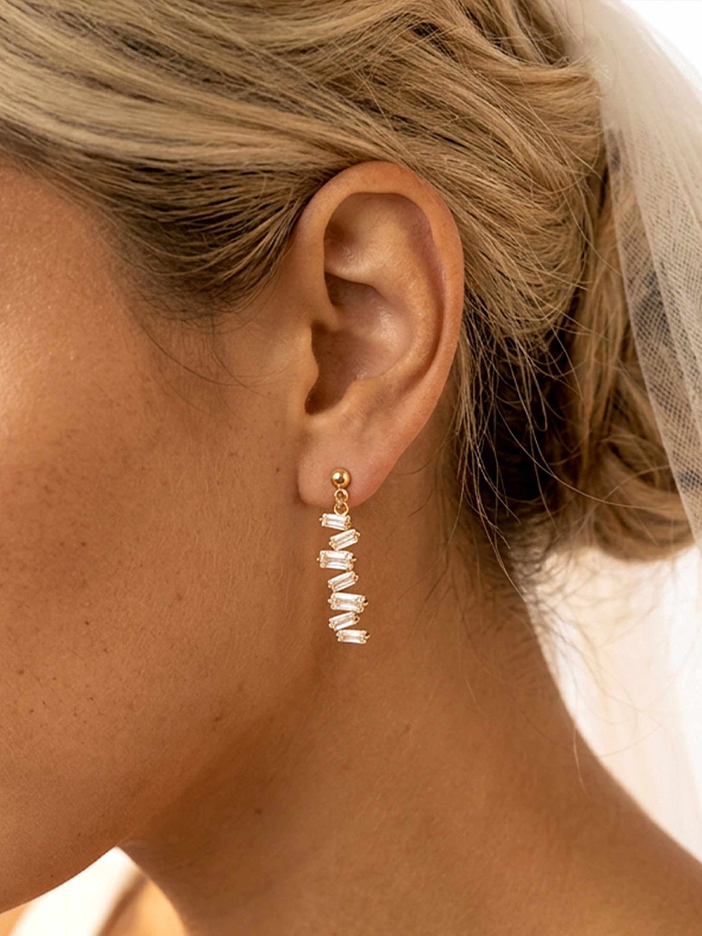 Vertical Dangle Earrings With Baguette Stones