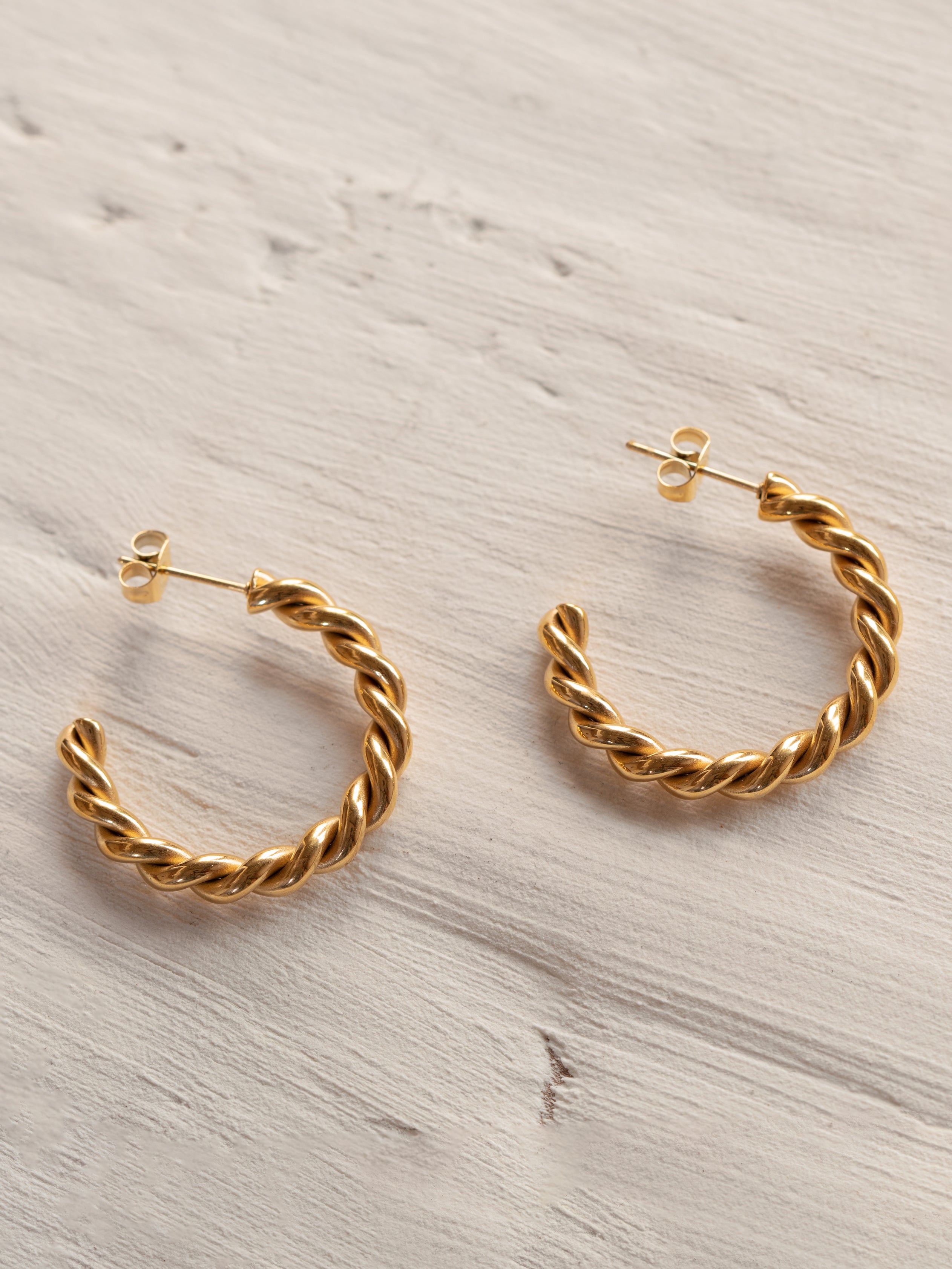 Gold Twisted Croissant Hoop Earrings