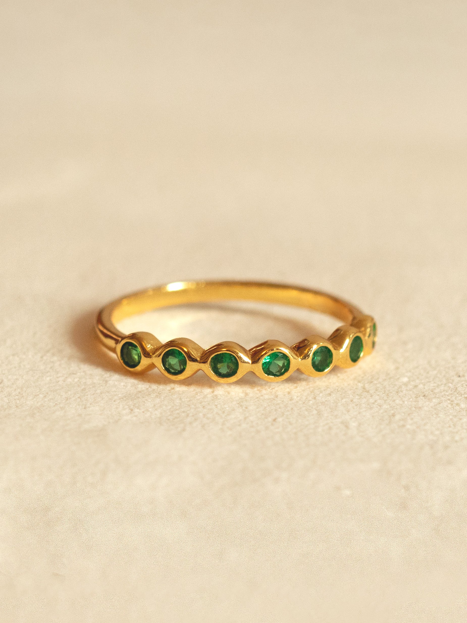 Gold Ring With Emerald Green Stones