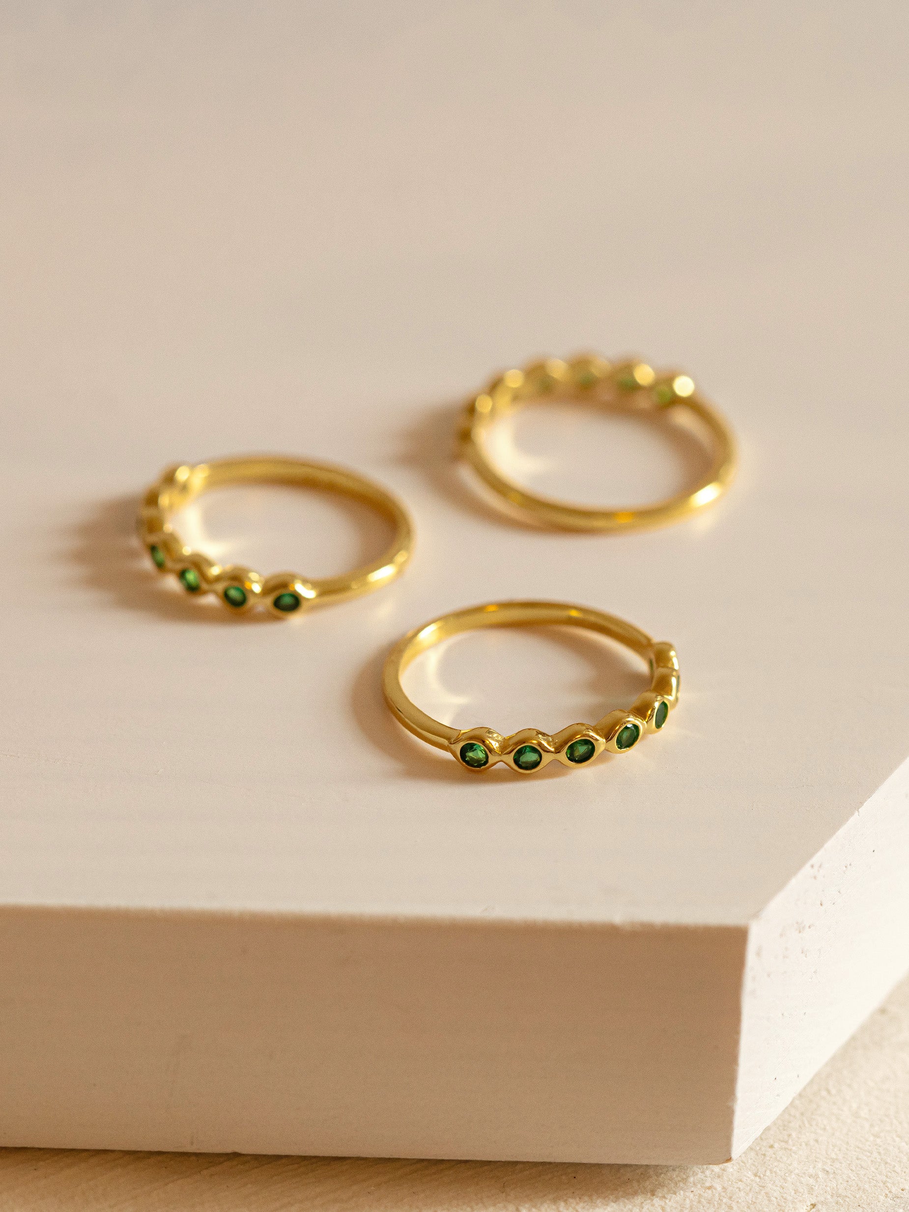 Gold Ring With Emerald Green Stones