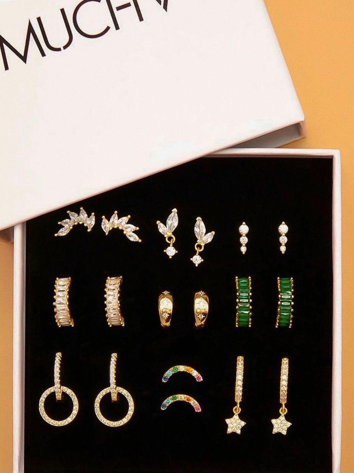 Gold cubic zirconia stud earrings for women in various styles